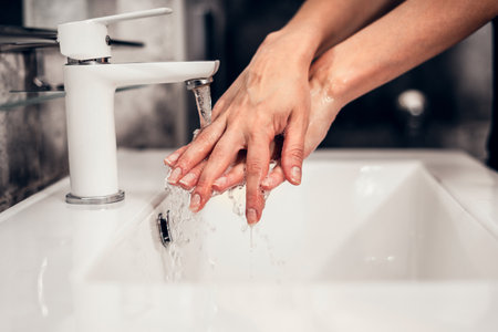 Coronavirus. Proper washing and handling of hands. Liquid antibacterial soap. Self-isolation and hygiene.の写真素材