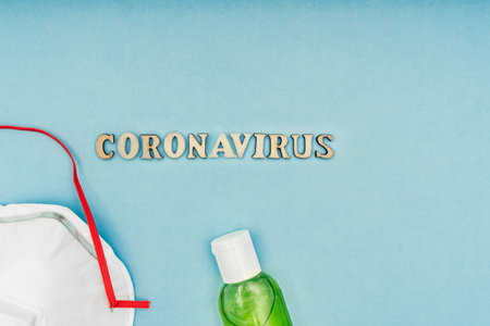 Coronavirus, covid-19. The inscription coronavirus on a blue background. Self-isolation and quarantine, personal protective equipment, phonendoscope and stethoscope.の写真素材