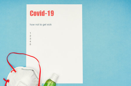 Coronavirus, Covid-19. How not to get infected, the inscription and paragraphs on a white sheet, personal protective equipment. Public awareness.の写真素材