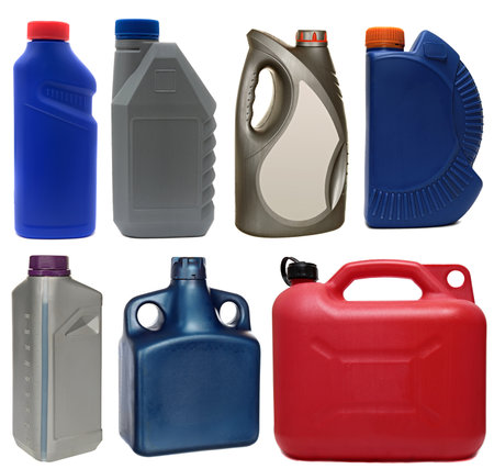 Plastic bottles from automobile oils isolated on a white の写真素材