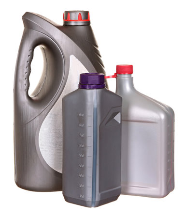 Plastic bottles from automobile oils isolated on a white の写真素材