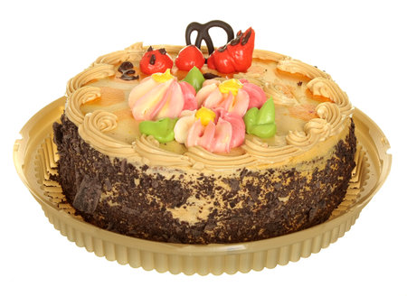 cake isolated on a white . Cake With Chocolate, Fruit And Cream.の写真素材