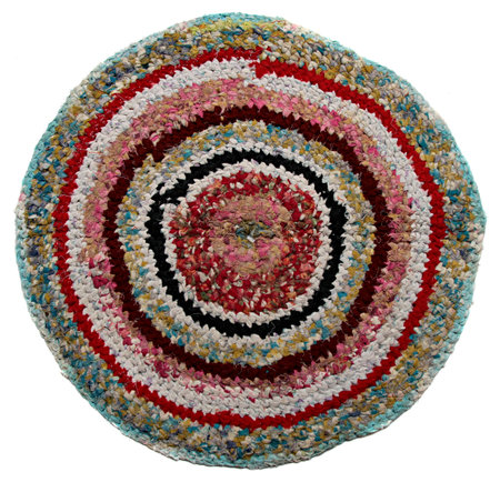 knit Mat handmade. Isolated on a white . round carpet knitの写真素材