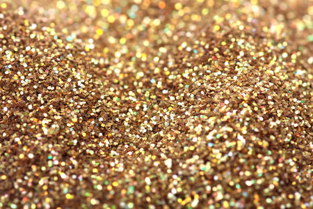 Gold nuggets sparkling carpet. Close-up view, very shallow deep of field .の写真素材