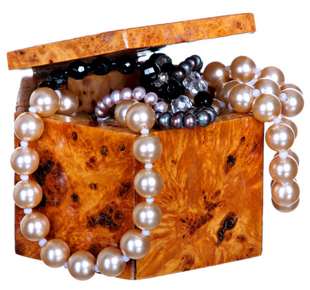 Jewelry box with beads, pearls and jewellery isolated on a white .の写真素材