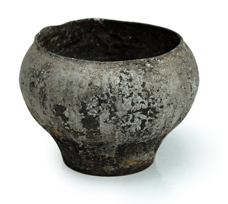 Cast iron a large pot, the pot from the iron round to extinguish the fire and boiling in the Russian oven.の写真素材