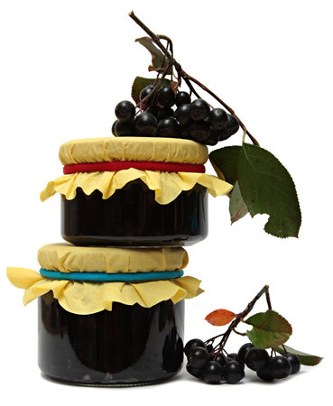 jam from chokeberry and fresh berries isolated on a white background.の写真素材