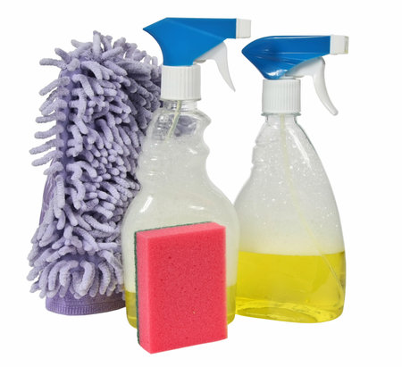 cleaning equipment isolated on a white background. colored plastic bottles with Detergent isolated...