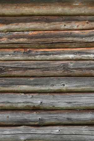 Wooden wall from logs old as background textureの写真素材