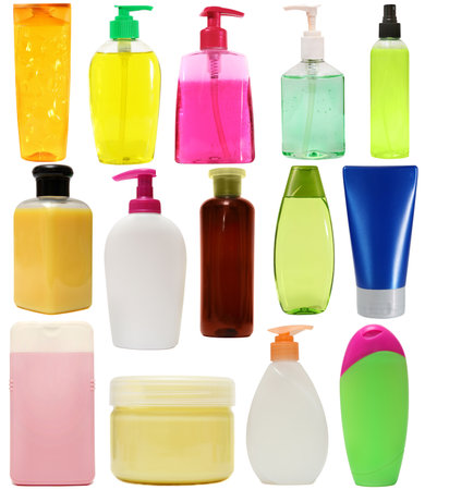 colored plastic bottles with liquid soap and shower gel isolated on white background . Studio shooting. Set.の写真素材