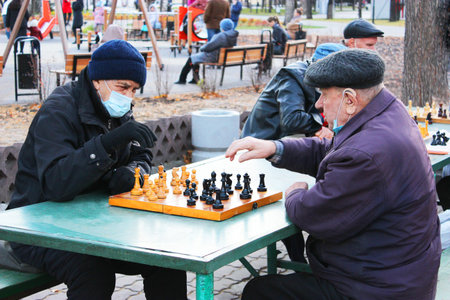 masked old men, playing chess in the park