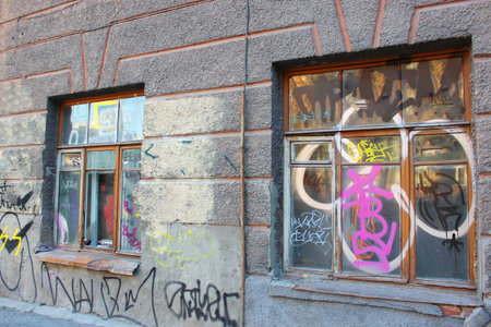 the facade of the historic building was painted with vandals and trash was thrownの写真素材