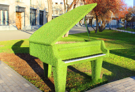 A green bench in a park. Novosibirsk October 21, 2020のeditorial素材