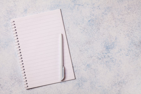 White notepad on a gray backgroundの写真素材