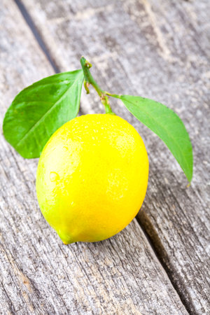 Lemon on a wooden backgroundの写真素材
