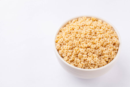 raw pasta in a white bowlの写真素材