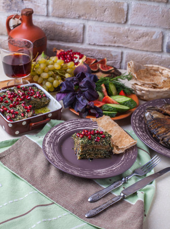 eggplant with garlic, walnuts and greensの写真素材