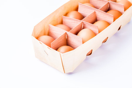 eggs in birch bark box isolated on white background, horizontal, copyspace