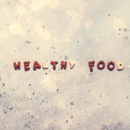 Dry breakfast, granola, muesli on a gray background square top view copyspace flat layの写真素材