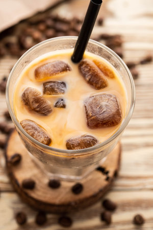 Cold fresh ice coffee close up. Copy space.