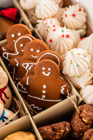 Tasty homemade Christmas cookies in a craft box. closeup view