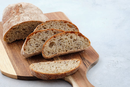 Fresh homemade rye ciabatta. The concept of comfortable delicious family food. Carbohydrates....
