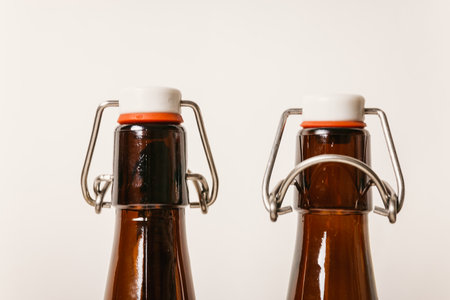 two empty Brown bottles with lids.の写真素材