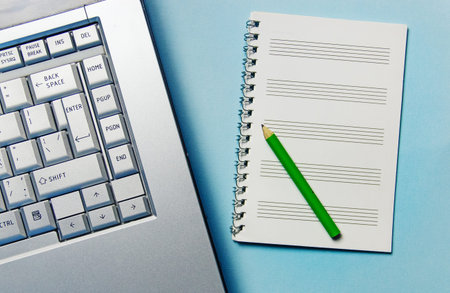 pencil, Notepad for recording and laptop. Office theme