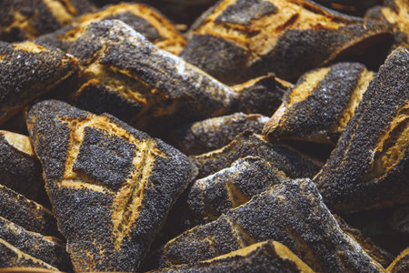 freshly baked bread and baked goods in a basket on the counter of the bakery