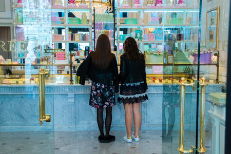 Moscow, Russian Federation- April 30, 2018, Two girls in a French patisserie Laduree.のeditorial素材