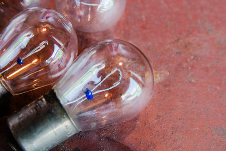 abstract background, several small light bulbs light selective focus.