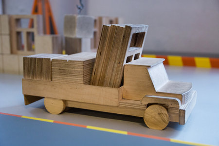 model of wooden truck loaded with windows toy car.の写真素材