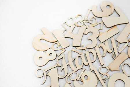 chaotic background of numbers from zero to nine and spell Happy. Background with numbers. Textures of numbers with copy space.の写真素材