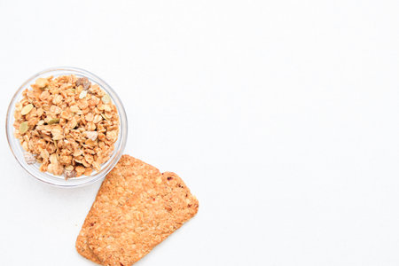 Crispy muesli dry Breakfast isolated on white background selective focus, top view.の写真素材