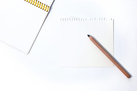 education or draw, sketch concept: several pencils and composition clean notepad against the...