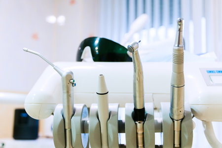 Stomatological tool kit. Closeup hightech Dentist equipments.の写真素材