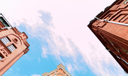 Business brick buildings skyline looking up with sky, modern architecture. Financial district. Moscow, Russia, May 2020.のeditorial素材