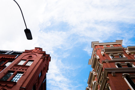 Business brick buildings skyline looking up with sky, modern architecture. Financial district. Moscow, Russia, May 2020.のeditorial素材