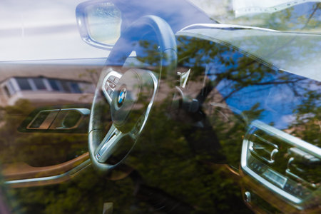 Parked car, BMW car interior through the glass. Moscow, Russia, May 2020.のeditorial素材