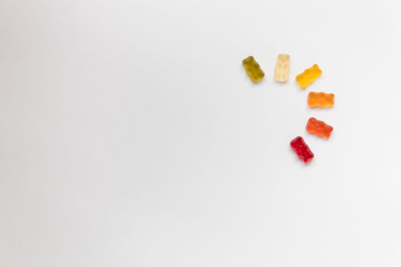 jelly bears lie on a white background