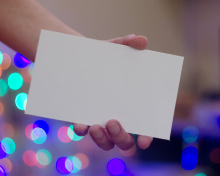 mock up greeting card in women hand. Perfect for your Christmas and New Year designの写真素材