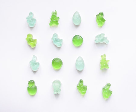 Easter jelly bunny with crimson and eggs isolated on white background marmalade sweetsの写真素材