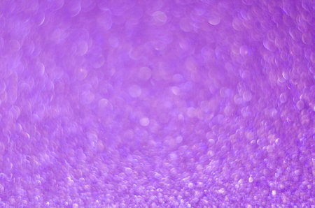 Abstract festive pink bokeh background with shining defocus sparkles. Blurred glitters shimmering...