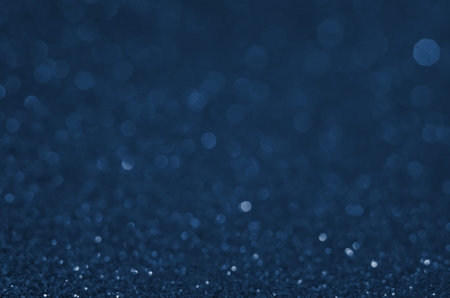 Classic Blue color. Color of the year 2020. Abstract festive bokeh background with shining defocus...