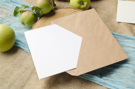 Summer stationery mockup scene with with apples, blue runner, on a beige background in rustic style...