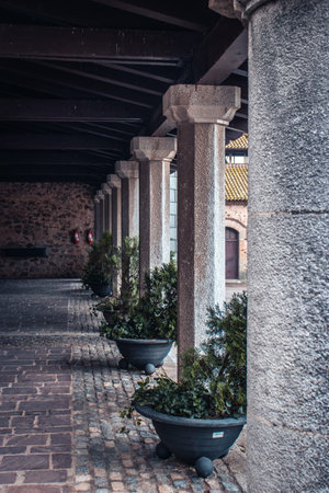 Arcade passageway of an old farm house photo. Small village in Catalonia photography. Ancient arcades passageway in Spain. High quality picture for wallpaper, articleの写真素材