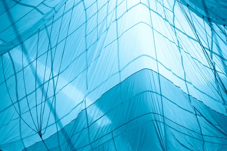 blue abstract background, parashute, bend lines.Concept for computer backgroundの写真素材