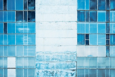 Wall of an abandoned building with stained-glass windowsの写真素材