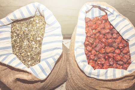 dry oriental fruit in bags from the eastern marketの写真素材