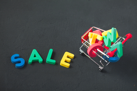 sale, discount, consumer trolley with letters Copyspace Top view.の写真素材
